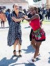 <p>Anything a man can do, she can do backward — and in wedges! Four months after welcoming son Archie, Meghan Markle dazzled during a visit to Nyanga Township with Prince Harry in Cape Town, South Africa. The couple had "great" skills, local resident Nosisana Nama told PEOPLE in 2019. "They've got their African moves."</p>