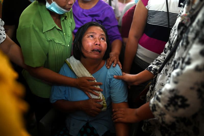 Relatives mourn Min Khant Soe, who was shot and killed during the security force crack down on anti-coup protesters in Yangon