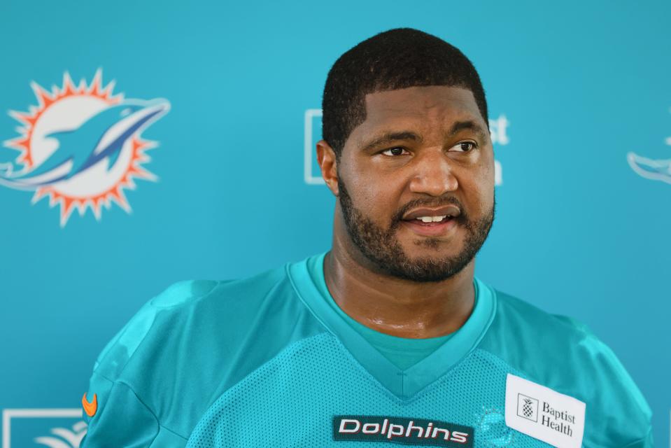 Jul 24, 2024; Miami Gardens, FL, USA; Miami Dolphins defensive tackle Calais Campbell (93) talks to reporters during training camp at Baptist Health Training Complex. Mandatory Credit: Sam Navarro-USA TODAY Sports