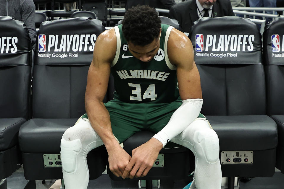 MILWAUKEE, WISCONSIN - APRIL 26: Giannis Antetokounmpo #34 of the Milwaukee Bucks sits on the bench after losing Game 5 of the Eastern Conference First Round Playoffs against the Miami Heat in overtime at Fiserv Forum on April 26, 2023 in Milwaukee, Wisconsin. NOTE TO USER: User expressly acknowledges and agrees that, by downloading and or using this photograph, User is consenting to the terms and conditions of the Getty Images License Agreement. (Photo by Stacy Revere/Getty Images)