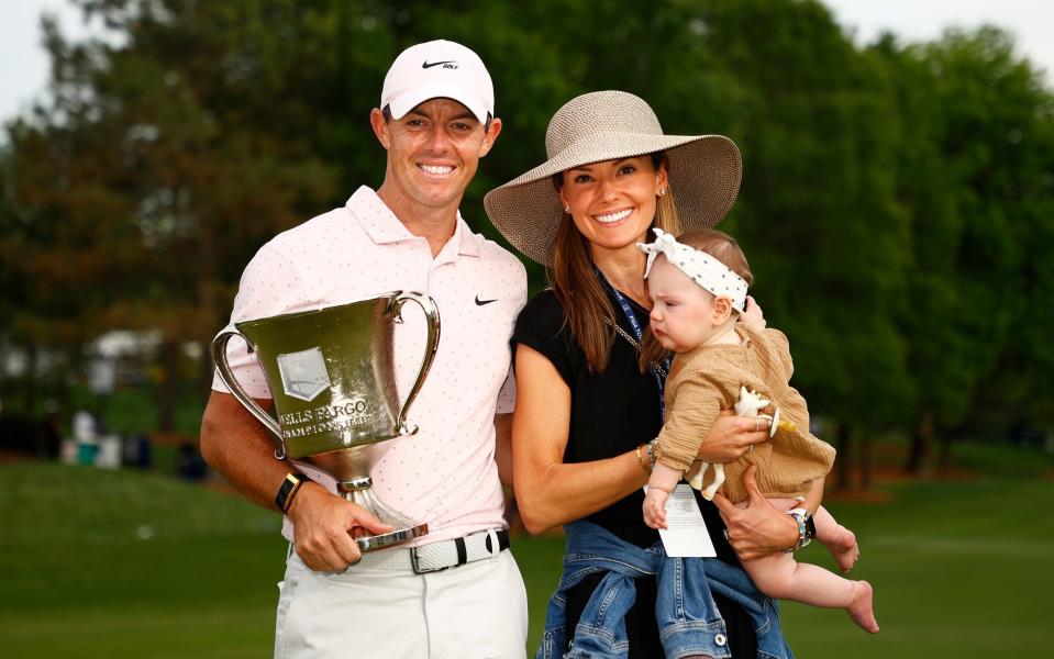 McIlroy was quick to celebrate with his young family - wife Erica and daughter Poppy - GETTY IMAGES