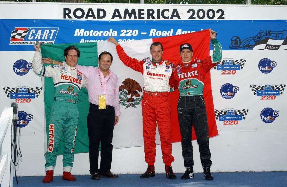 Hector Rebaque, second from left, winner of the 1982 Road America 200, poses with Mexican drivers Mario Dominguez, Michel Jourdain and Adrian Fernandez during a celebration of the 20th anniversary of Rebaque's only Indy-car victory.