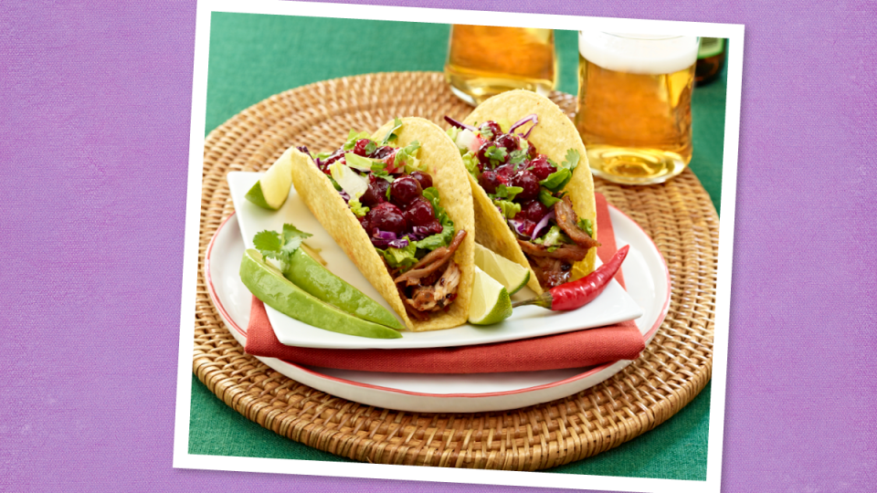 Zesty Southwest Turkey Tacos sits on a purple background (taco tuesday recipes)