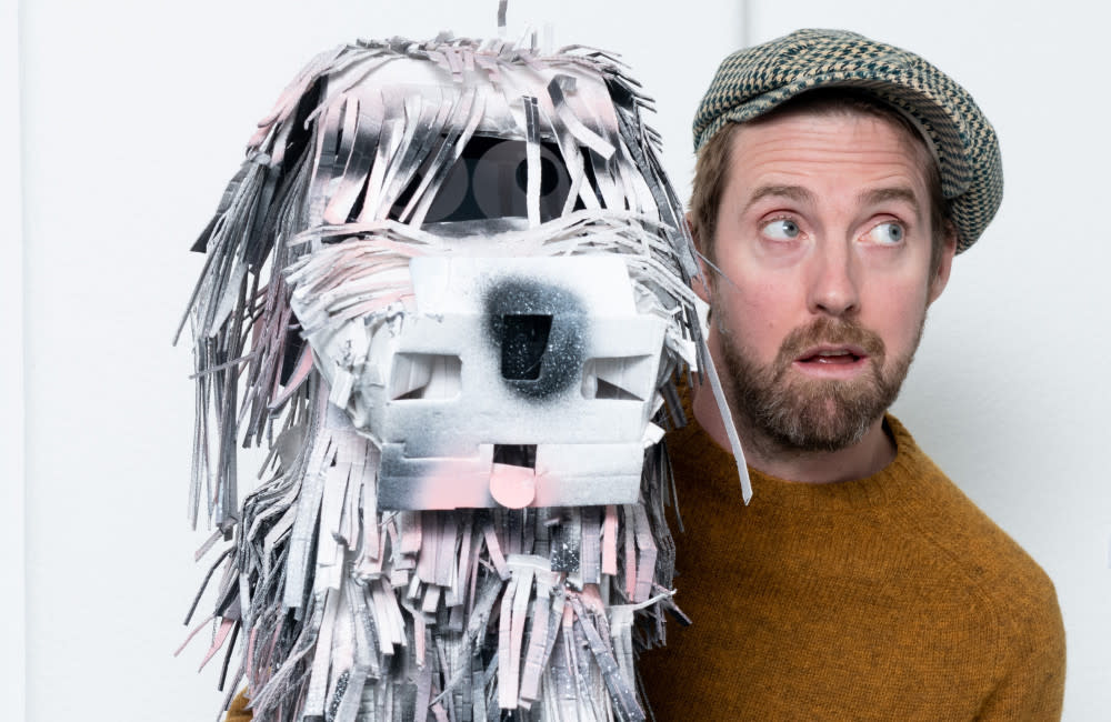 Kaiser Chiefs' frontman Ricky Wilson and his dog sculpture credit:Bang Showbiz