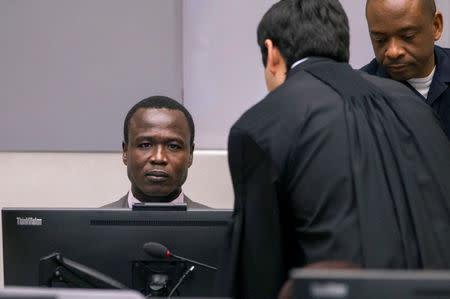 Dominic Ongwen, a former senior rebel commander from the Lord's Resistance Army in Uganda, stands in the courtroom of the International Criminal Court (ICC) during the confirmation of charges in The Hague, the Netherlands January 21, 2016. REUTERS/Michael Kooren/File Photo