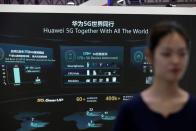 FILE PHOTO: Information on Huawei's 5G equipment is seen on a screen at the World 5G Exhibition in Beijing