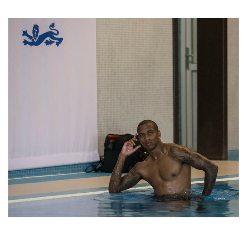 Ashley Young poses for a photograph taken by team mate Jesse Lingard at the ForRestMix Hotel in Repino