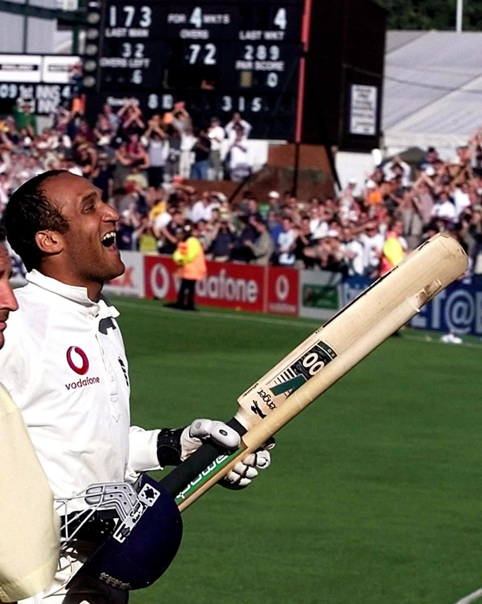 Mark Butcher celebrated after hitting the winning runs against Australia at Headingley in 2001 (Gareth Copley/PA) (PA Archive)