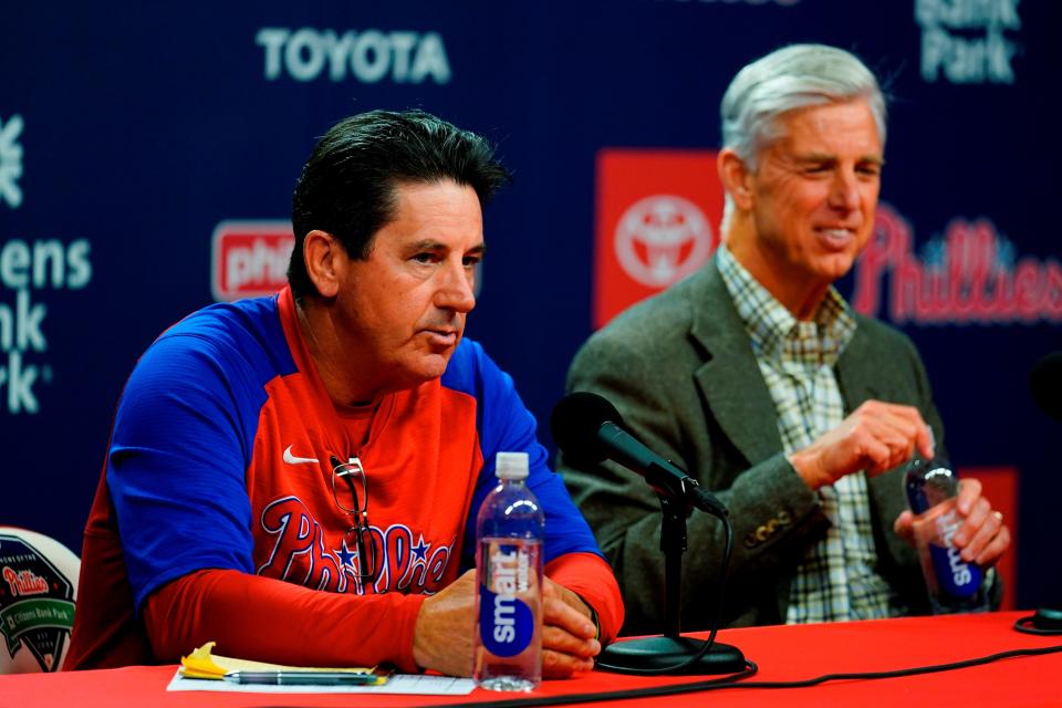 Phillies president of baseball operations Dave Dombrowski, right, and interim manager Rob Thomson participate in a news conference Friday after the firing of manager Joe Girardi.