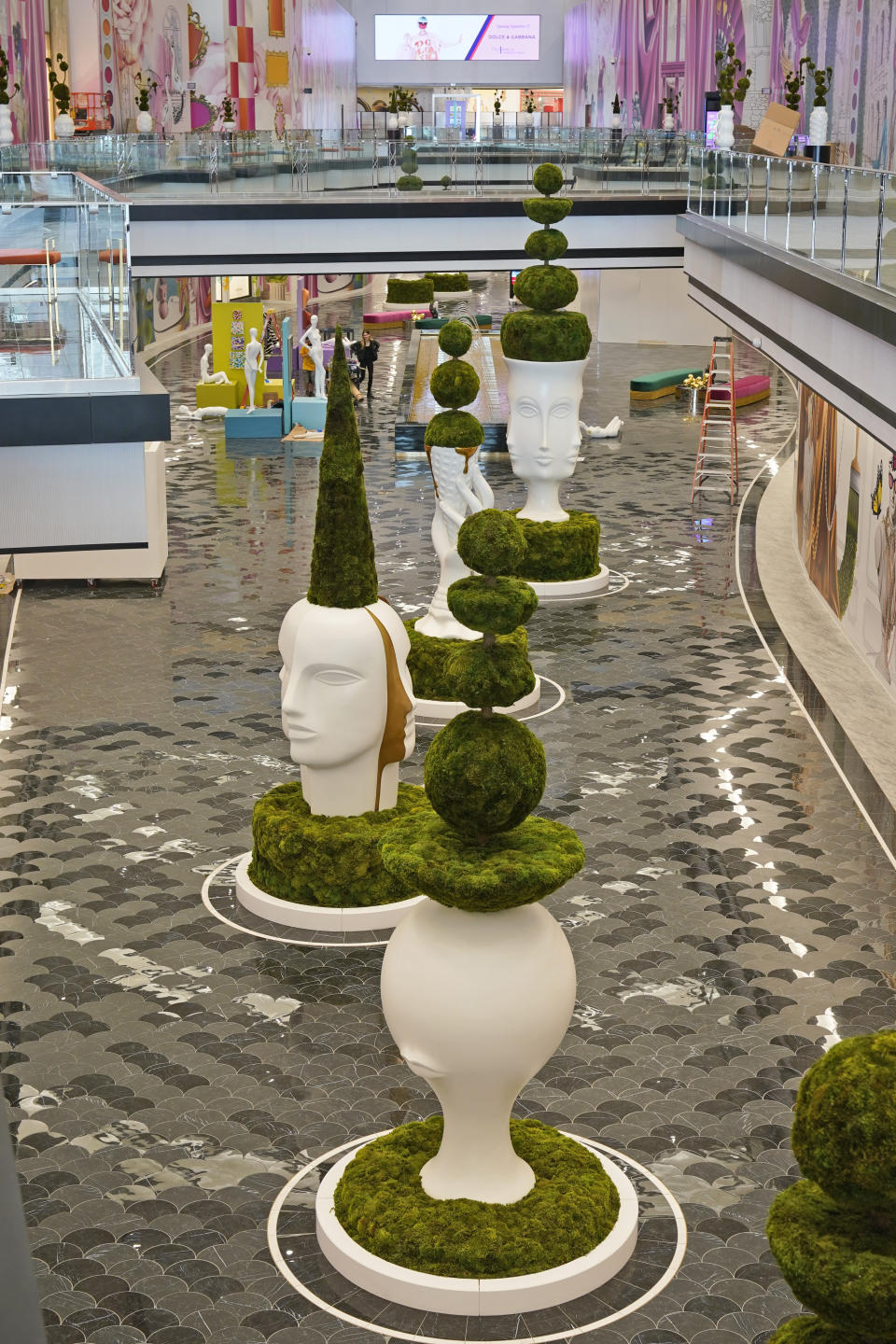 Sculptures by Jonathan Adler are displayed in The Avenue, a luxury shopping wing of the American Dream mall, before its grand opening in East Rutherford, N.J., Wednesday, Sept. 15, 2021. If you build it during a pandemic, will they still come? American Dream put that to the test when it opened the new luxury shopping wing of its megamall in September. The new wing comes as the world grapples with the highly contagious delta variant of the coronavirus, which continues to threaten life — and business — from returning to normal. (AP Photo/Seth Wenig)