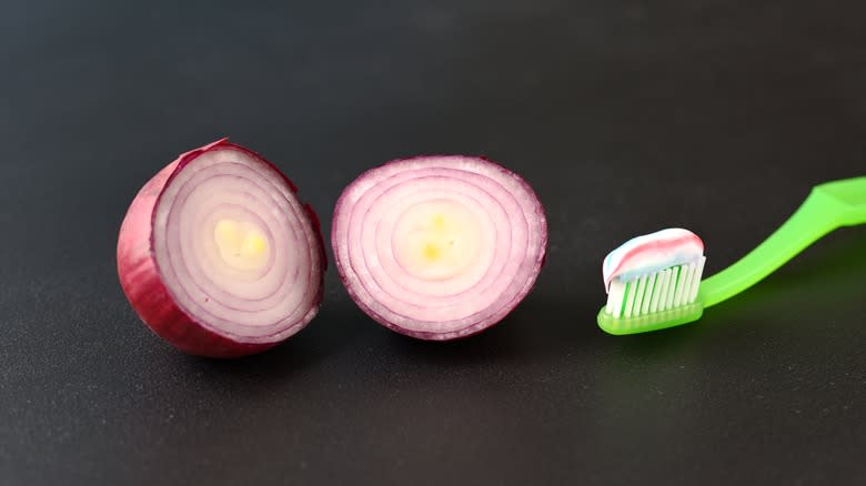 sliced onion and toothbrush