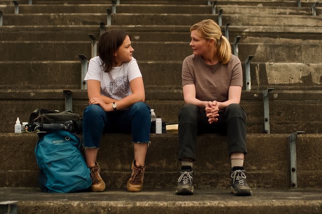 <p> Courtesy of A24</p> Cailee Spaeny and Kirsten Dunst in 'Civil War'