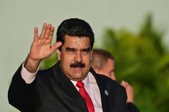 The opposition is hoping to get more than 7.5 million signatures -- the number needed to oust President Nicolas Maduro (pictured) in an ultimate recall vote -- in a symbolic show of his government's unpopularity (AFP Photo/Ronaldo Schemidt)