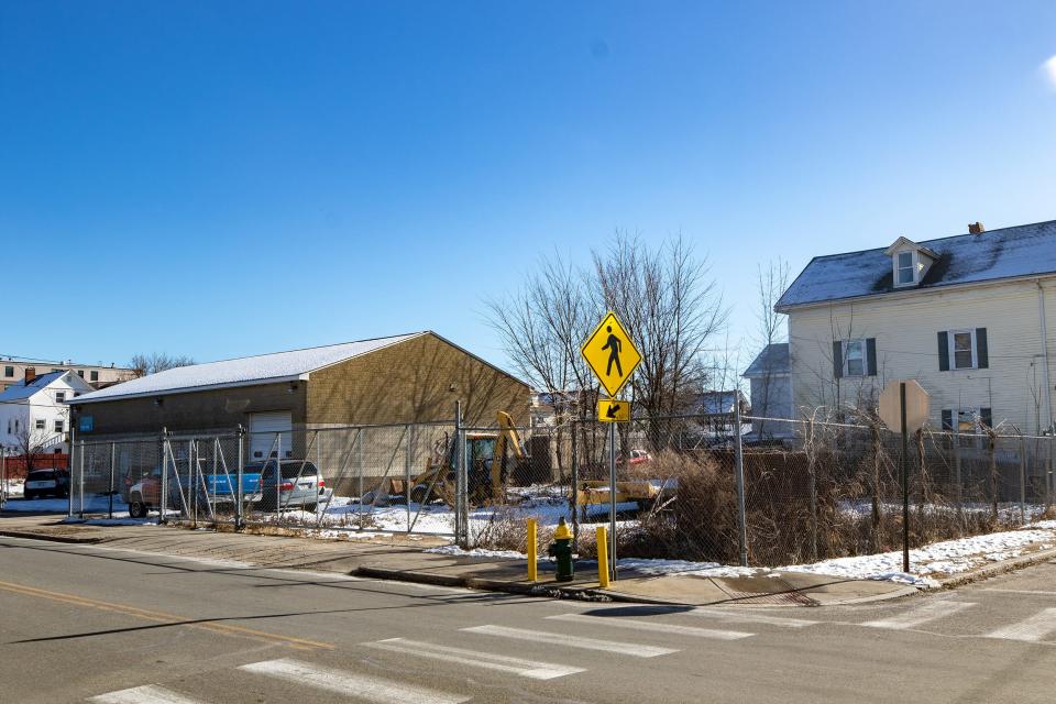 This plumbing supply shop could expand fleet maintenance work into the empty lots next to it under a proposed zone change from residential to mixed-use industrial.