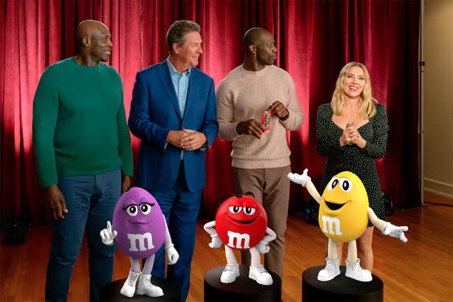 <p>M&Ms</p> NFL Legends Bruce Smith, Dan Marino, and Terrell Owens in the M&M's Super Bowl 2024 commercial with Scarlett Johansson