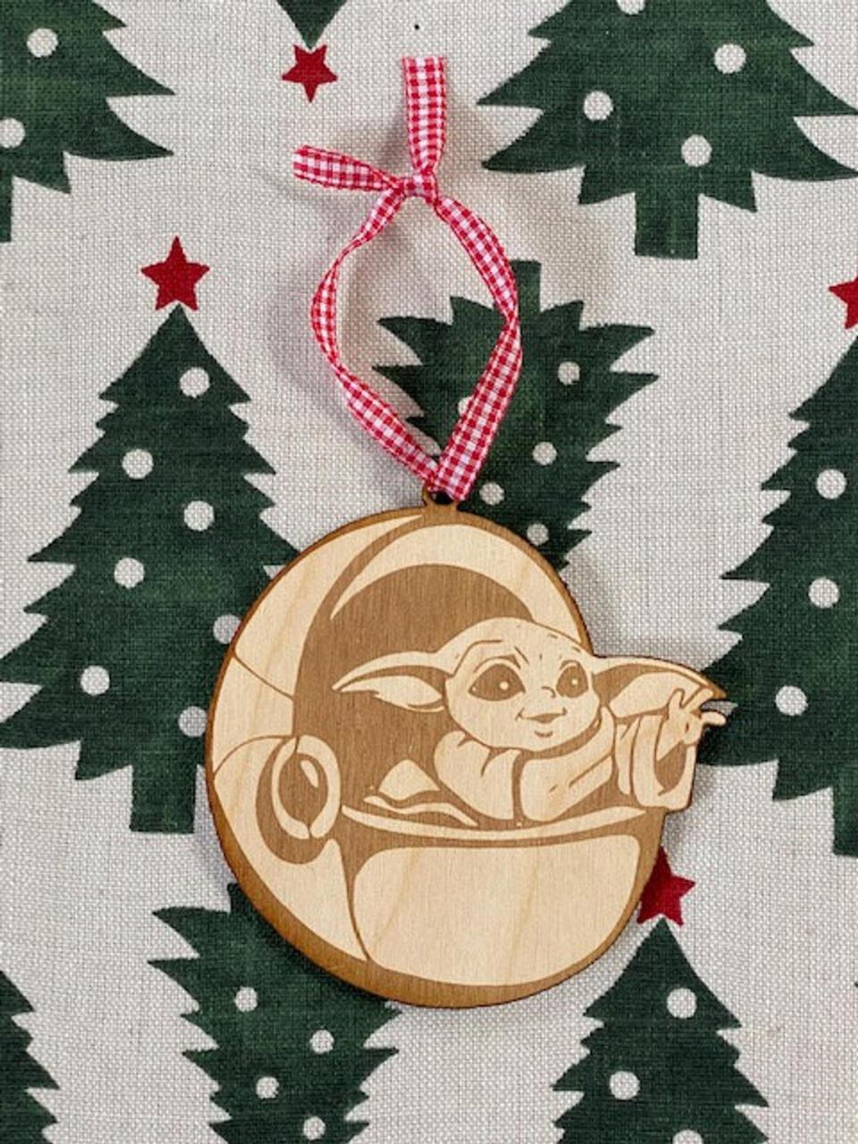 Get them into the holiday spirit with this ornament that's been handmade in the Midwest. It'll look perfect on a tree or just hanging around on a hook. And they'll definitely want to keep it around for years. <a href="https://fave.co/3qpSbVU" target="_blank" rel="noopener noreferrer">Find it for $8 on Etsy</a>. 