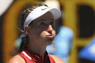 Victoria Azarenka of Belarus reacts after defeating Elina Svitolina of Ukraine in their third round match at the Australian Open tennis championships in Melbourne, Australia, Friday, Jan. 21, 2022. (AP Photo/Andy Brownbill)