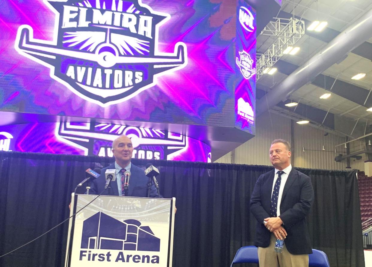 Mark Margeson, chairman of the Chemung County Industrial Development Agency, discusses a new hockey team that will come to the First Arena in Elmira during a news conference Wednesday, May 1, 2024. Looking on is Mark Frankenfeld, commissioner of the North American Hockey League.