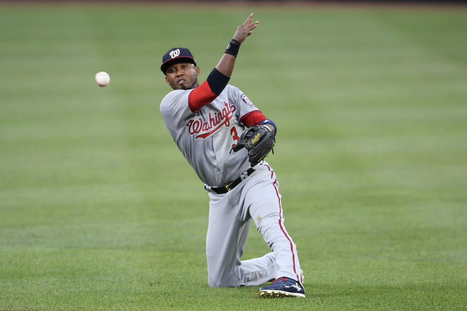 Washington Nationals second baseman Alcides Escobar throws to first to put out Baltimore Orioles' Ramon Urias during the fourth inning of a baseball game, Saturday, July 24, 2021, in Baltimore. (AP Photo/Nick Wass)