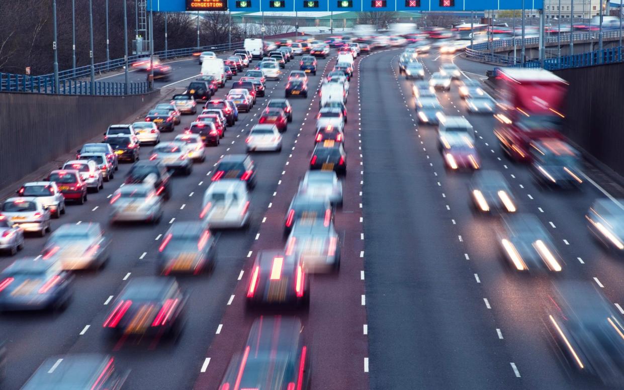 Rush hour on a UK motorway. Turning motorways into toll roads, pay-per-mile schemes and congestion charging zones have all been suggested as ways to plug the £37billion gap left by motoring taxes as people switch to electric vehicles - esp_imaging