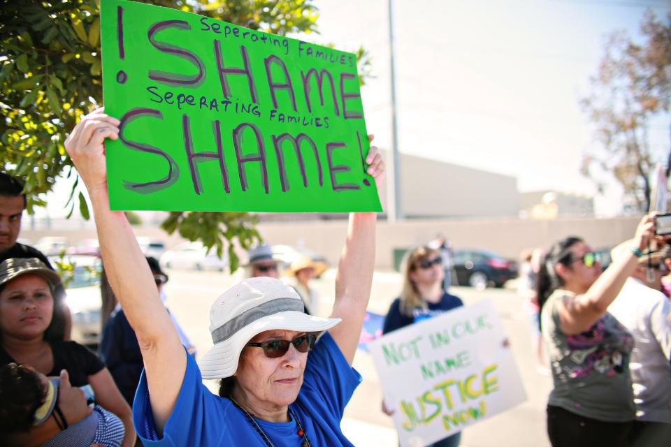 Protesters demonstrate against immigration enforcement officials separating undocumented families at the Otay Mesa Detention Center.