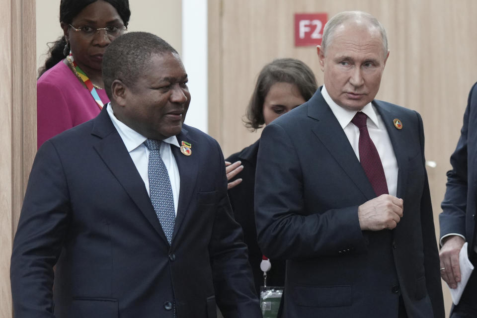 Russian President Vladimir Putin, right, and Mozambique President Filipe Nyusi arrive for a meeting on the sidelines of the Russia-Africa Summit and Economic and Humanitarian Forum in St. Petersburg, Russia, Thursday, July 27, 2023. (Alexei Danichev, Sputnik, Kremlin Pool Photo via AP)