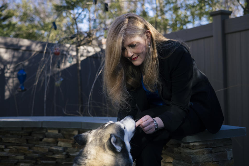 Lisa Sales with her dog Halo 