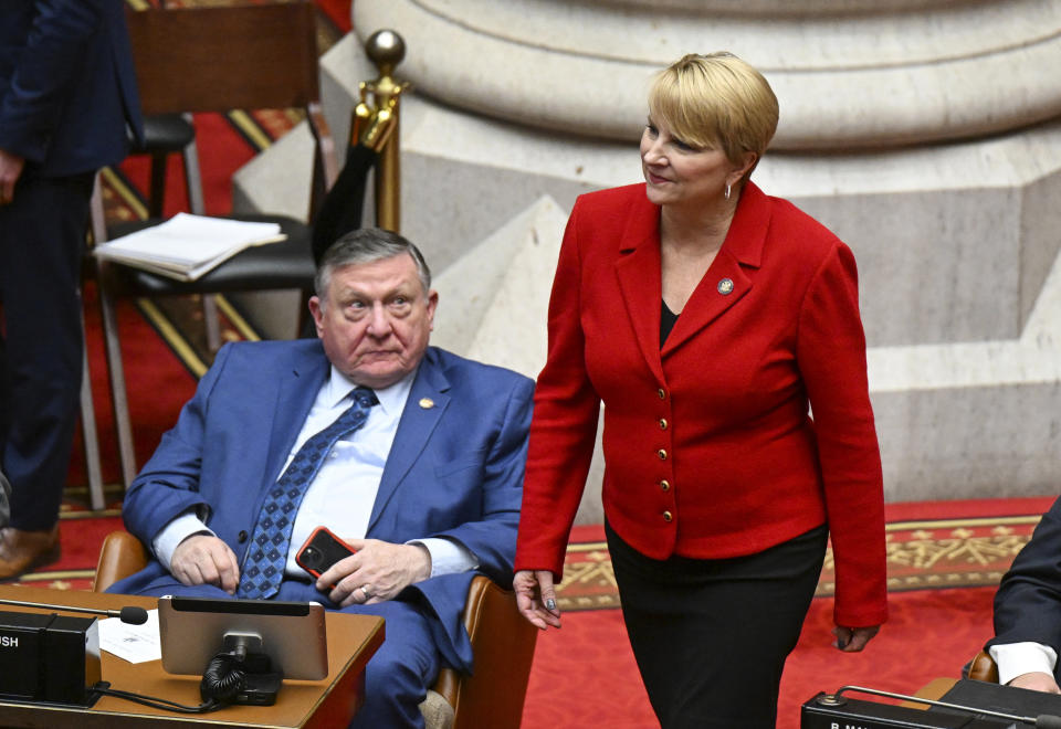 Assemblywoman Mary Beth Walsh, R- Ballston Spa, is seen debating legislation to approve a legislative pay raise during a special legislative session in the Assembly Chamber at the state Capitol, Thursday, Dec. 22, 2022, in Albany, N.Y. (AP Photo/Hans Pennink)