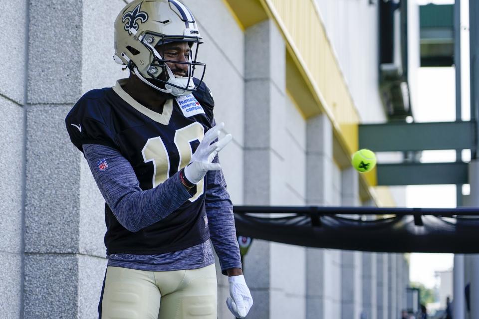 New Orleans Saints' Tre'Quan Smith warms up before an NFL football joint practice session with the Green Bay Packers Tuesday, Aug. 16, 2022, in Green Bay, Wis. (AP Photo/Morry Gash)
