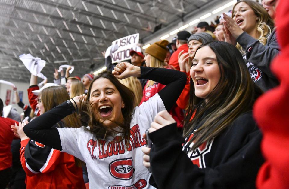 St. Cloud State fans celebrate a goal by their team during a game last season at the Herb Brooks National Hockey Center in St. Cloud.