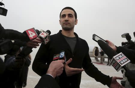 Former U.S. Marine Amir Hekmati, recently released from an Iranian prison, arrives at an airport in Flint, Michigan January 21, 2016. REUTERS/Rebecca Cook