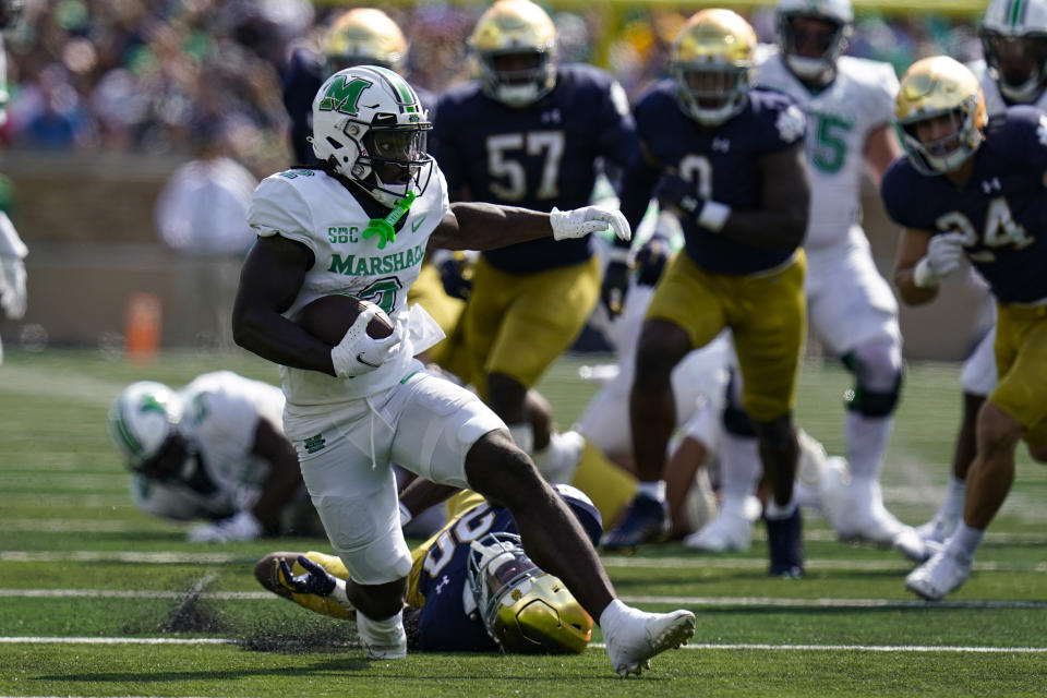 Marshall wide receiver Jayden Harrison runs after a catch against Notre Dame during the first half of an NCAA college football game in South Bend, Ind., Saturday, Sept. 10, 2022. (AP Photo/Michael Conroy)