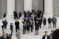 <p>Jack Phillips, center left and next to attorney Kristen Waggoner, waves to supporters as they leave the Supreme Court ‘Masterpiece Cakeshop v. Colorado Civil Rights Commission’ case, Tuesday, Dec. 5, 2017, in Washington. (Photo: Jacquelyn Martin/AP) </p>