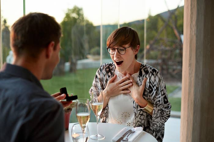 someone in shock after getting proposed to