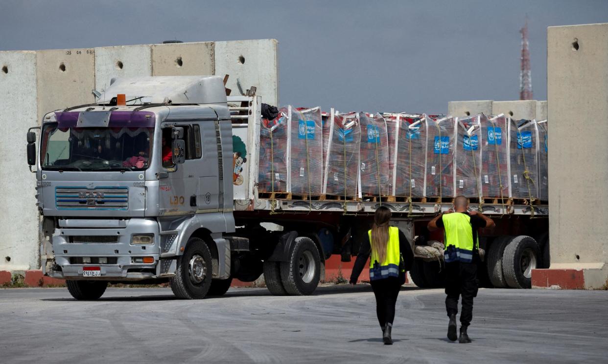 <span>A truck carrying humanitarian aid at the Kerem Shalom crossing between the Gaza Strip and Israel, 14 March.</span><span>Photograph: Carlos García Rawlins/Reuters</span>