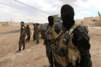 <p>Special forces from the Syria Democratic Forces gather in Haj Hussein village, after taking control of it from Islamic State fighters, in the southern rural area of Manbij, in Aleppo Governorate, Syria May 31, 2016. (REUTERS/Rodi Said) </p>