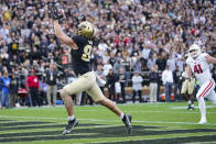 Purdue tight end Payne Durham (87) makes a catch for a touchdown against Wisconsin during the first half of an NCAA college football game in West Lafayette, Ind., Saturday, Oct. 23, 2021. (AP Photo/Michael Conroy)