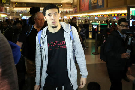 UCLA basketball player LiAngelo Ball arrives at LAX after flying back from China where he was detained on suspicion of shoplifting, in Los Angeles, California U.S. November 14, 2017. REUTERS/Lucy Nicholson