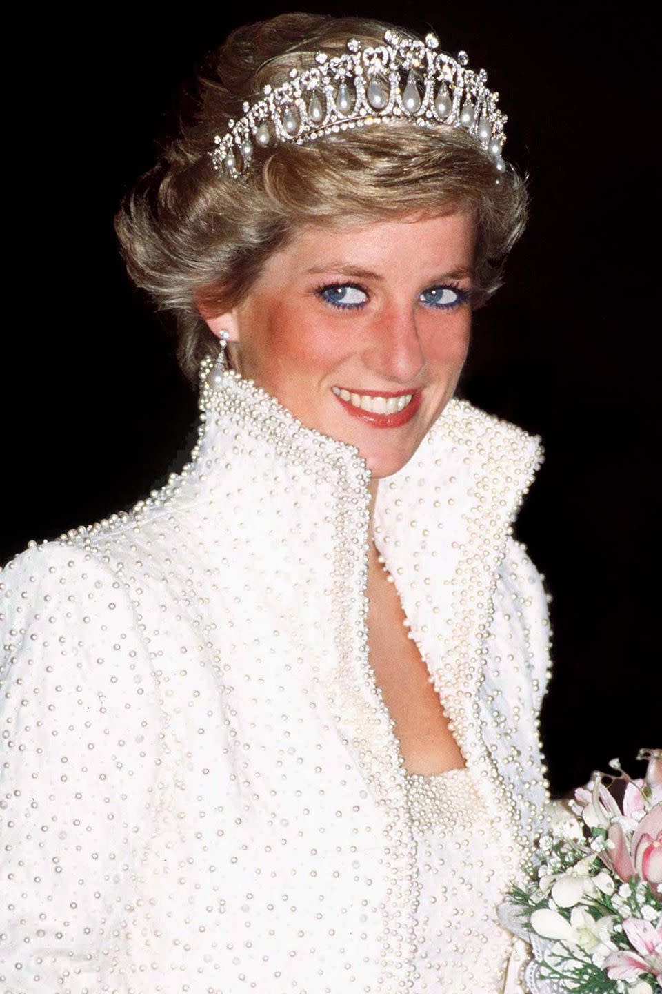 <p>In a diamond and pearl tiara during a visit to Hong Kong. </p>