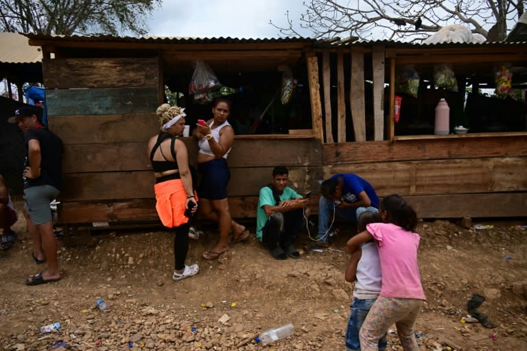 Migrant children, like these playing at a reception station in Panama in March, are crossing the perilous Darien Gap in soaring numbers, the UN says (MARTIN BERNETTI)