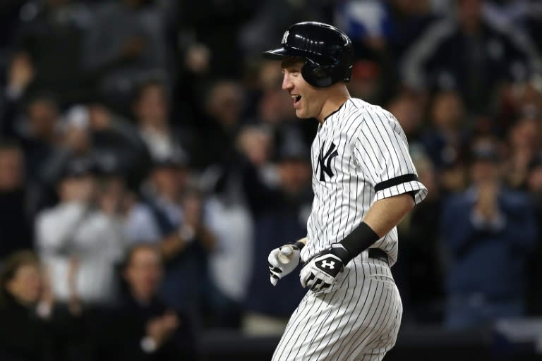 Todd Frazier of the New York Yankees celebrates hitting a 3-run home run against the Houston Astros during the second inning in Game Three of the American League Championship Series, at Yankee Stadium in New York, on October 16, 2017