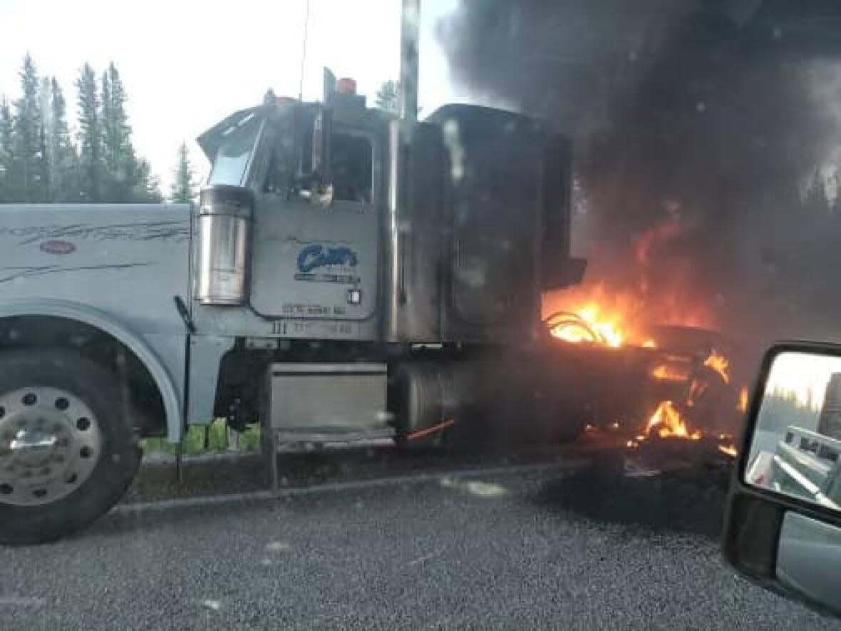 A semi-truck was found on fire in Enterprise, N.W.T., say RCMP in a news release Thursday. (Melanie Carter/Facebook - image credit)