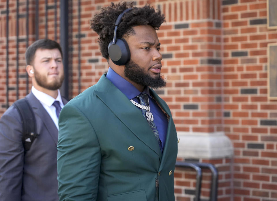 Rutgers defensive lineman Rene Konga makes his way to the visiting locker room before an NCAA college football game against Iowa, Saturday, Nov. 11, 2023, in Iowa City, Iowa. (AP Photo/Bryon Houlgrave)