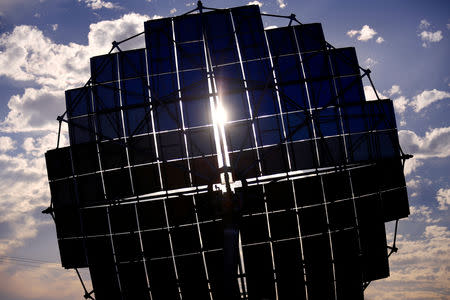 FILE PHOTO: A solar panel array can be seen at the Windorah Solar Farm, which was installed by Ergon Energy, near the town of Windorah in outback Queensland, Australia, August 11, 2017. REUTERS/David Gray/File Photo