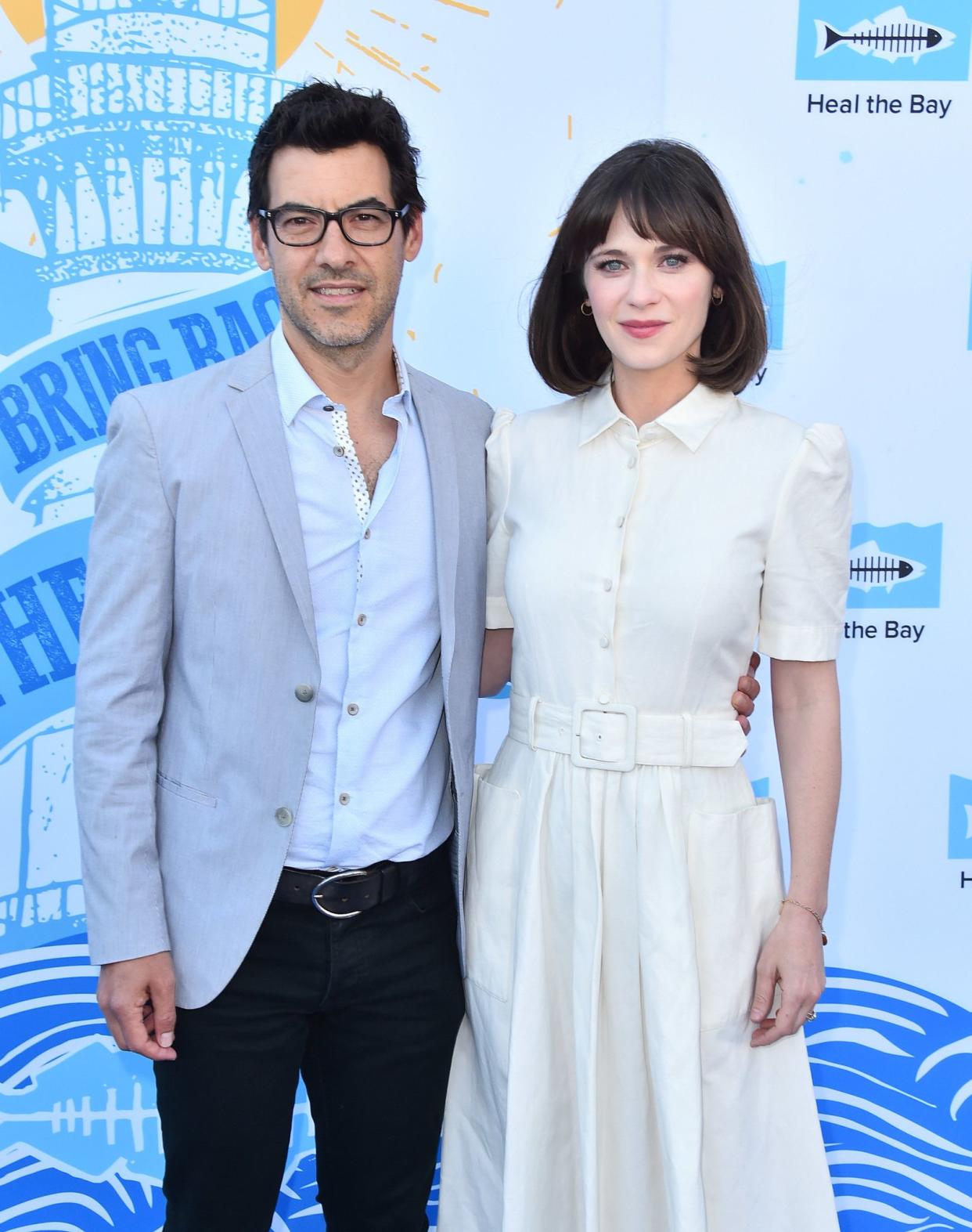 Zooey Deschanel and her husband Jacob Pechenik have broken up after four years of marriage. “After much discussion and a long period of contemplation we have decided we are better off as friends, business partners and co-parents rather than life partners,” the couple said in a statement on Sept. 6, 2019. “We remain committed to our business, our values, and most of all, our children. Thank you for respecting our privacy at this time.” The “New Girl” star and Pechenik, a producer, were first linked in 2014. They announced their engagement in January 2015 and wed six months later in June. They are parents to daughter Elsie, 4, and son Charlie, 2.