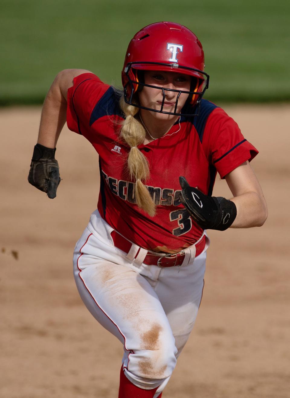 Tecumseh's Taylor Ash (3) heads for third base against Castle during their game at Tecumseh High School Wednesday evening, May 10, 2023. Castle won the game 7-4 in extra innings.