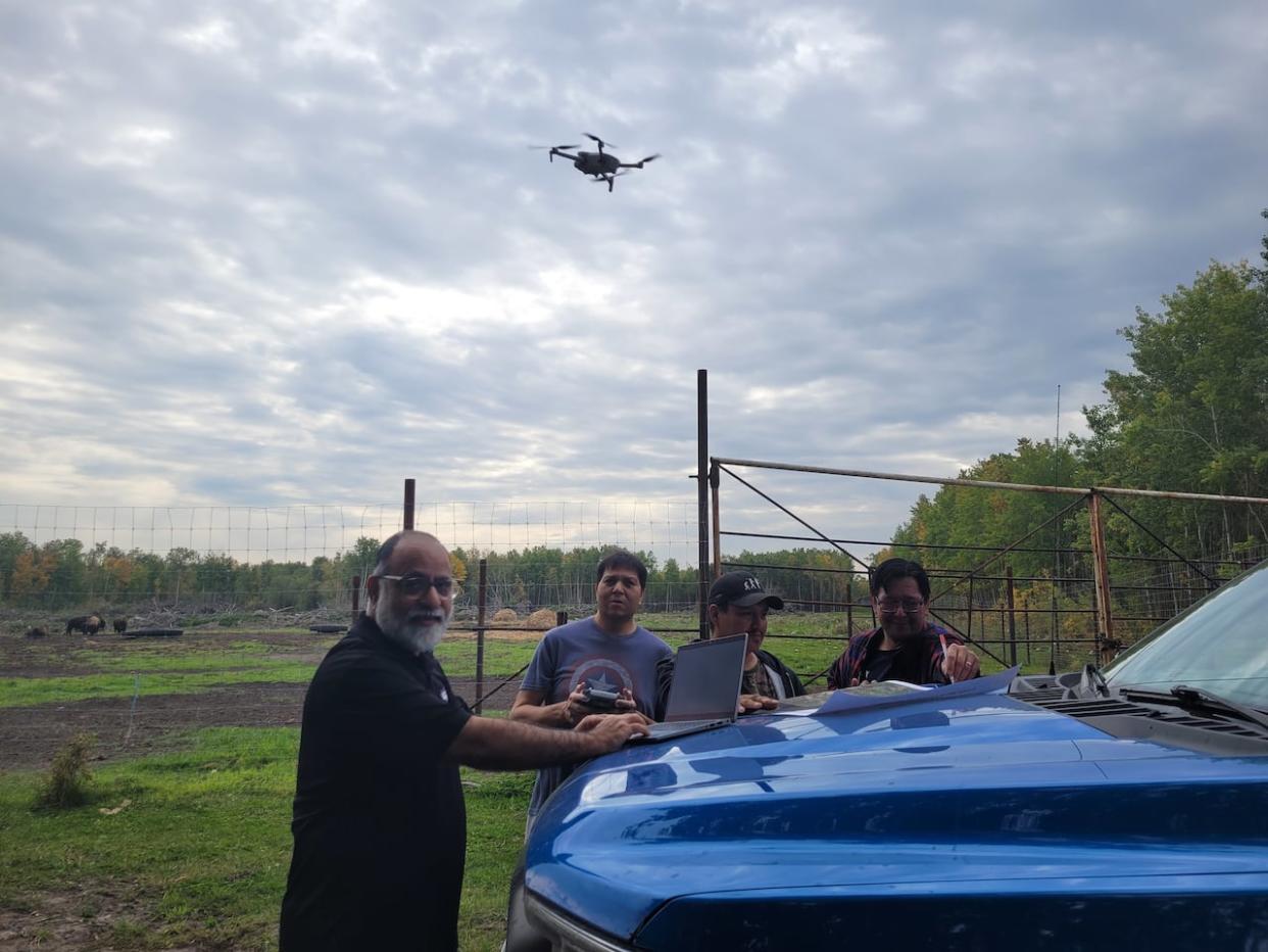 SAIT faculty and staff have partnered with Abdul Raouf, left, research chair at Saskatchewan Polytechnic, to create a digital map repository for Frog Lake First Nation.  (Submitted by Saskatchewan Polytechnic - image credit)