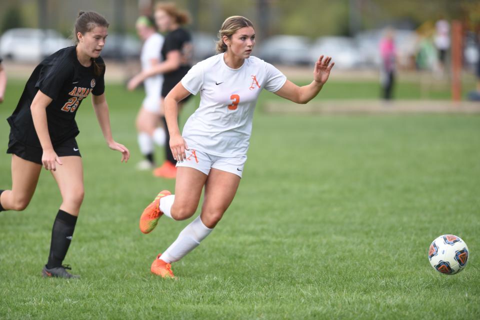 Almont's Lola Battaglia (3) controls the ball during a game earlier this season.