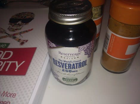 My bottle of Resveratrol (between my Dead Celebrity Cookbook and a bottle of curry powder.) 