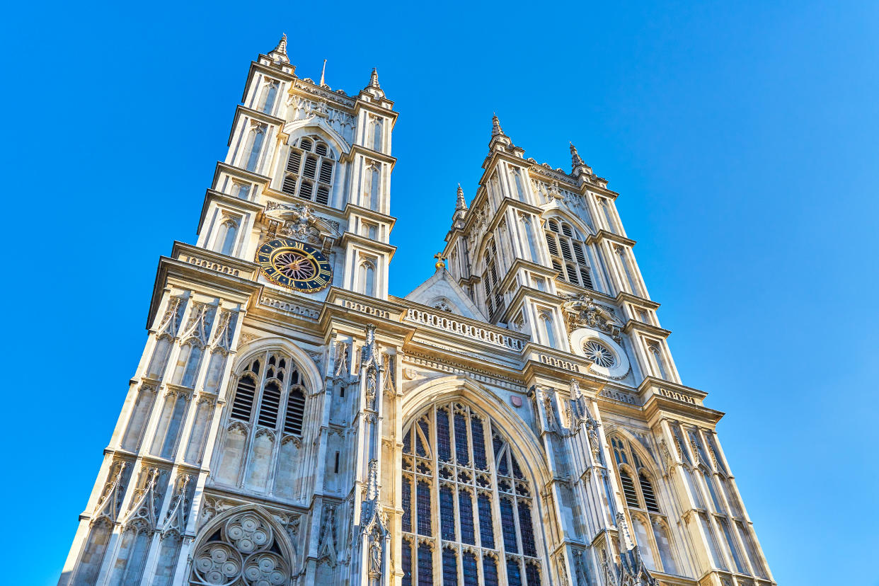Low Angle View Of Westminster Abbey Against Blue Sky, London, England.